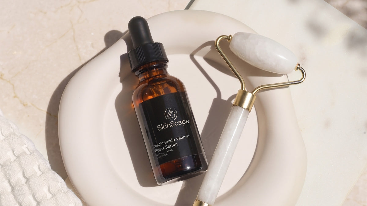 Niacinamide Vitamin Boost Serum with facial roller on dish